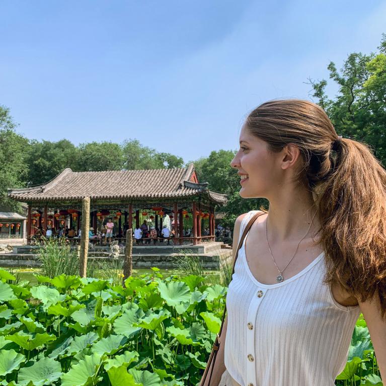 candid image of student in green field